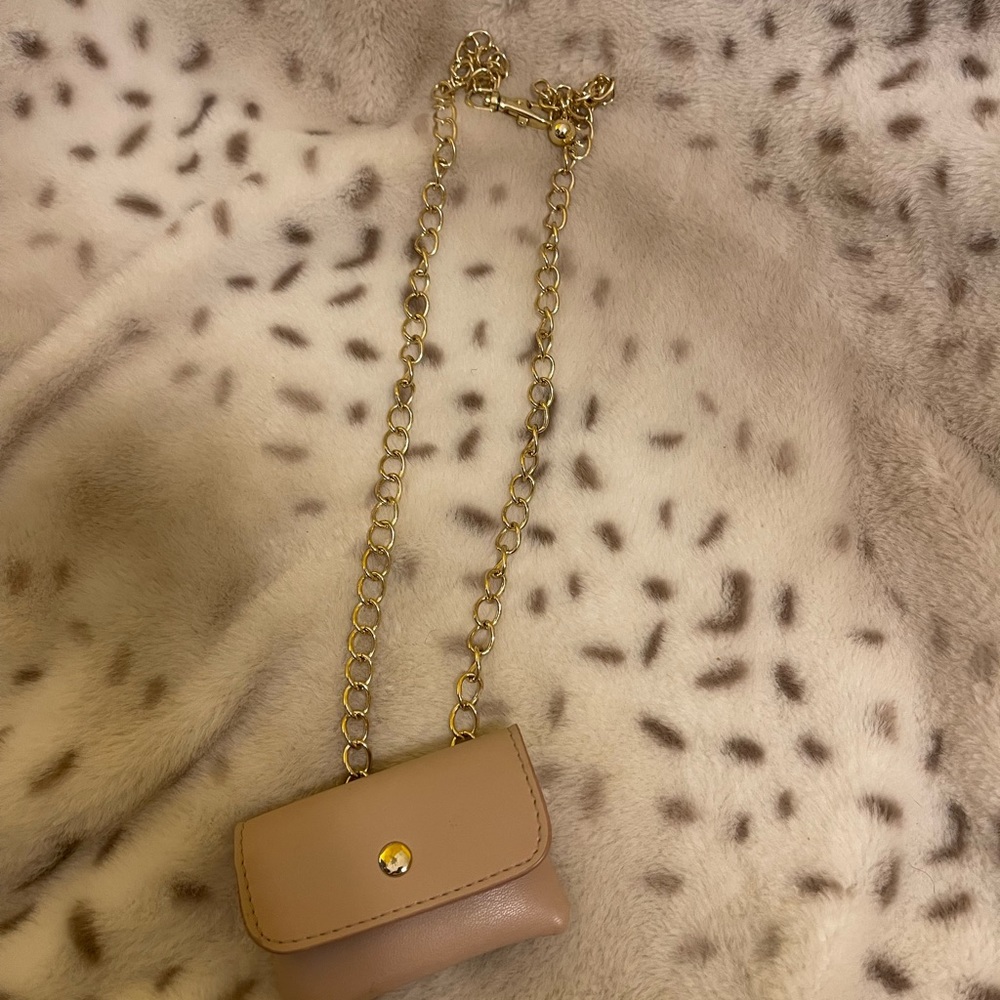 Pink leather gold chain belt with mini purse.